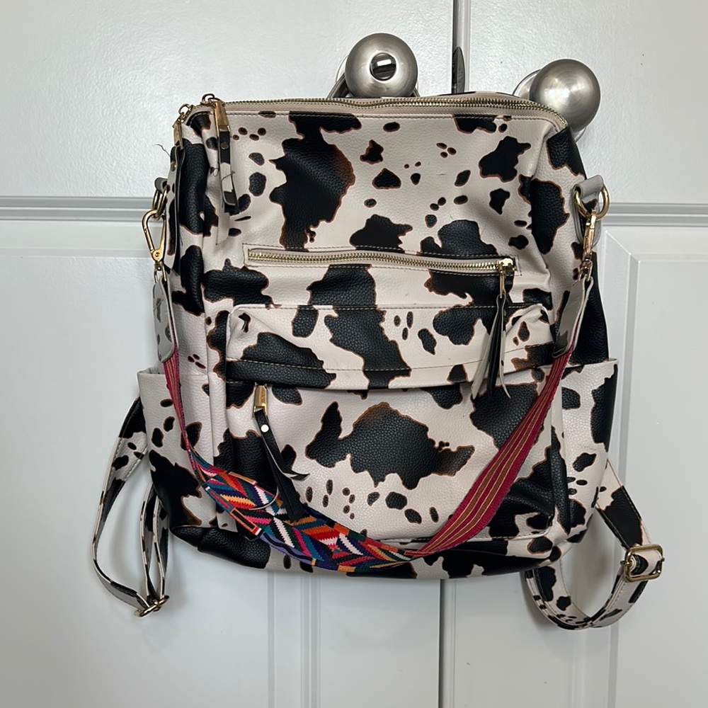 Faux leather fun Cow Print Backpack with colorful strap- lots of pockets!